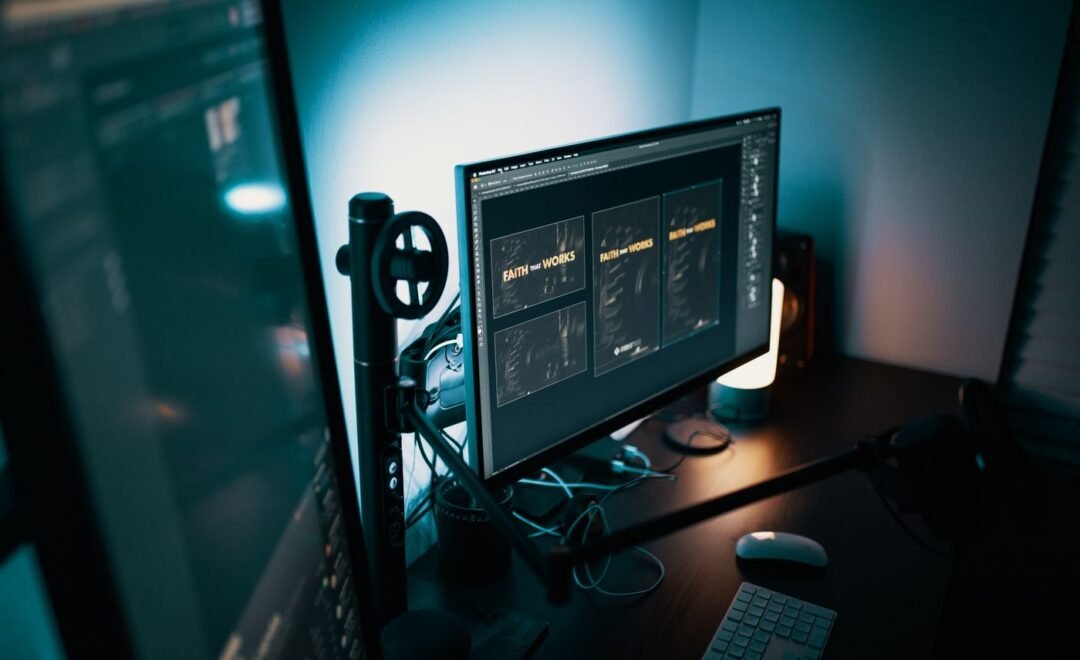 A developer workstation with code on two monitors