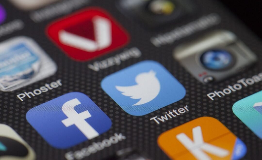 Social media app icons on a phone screen