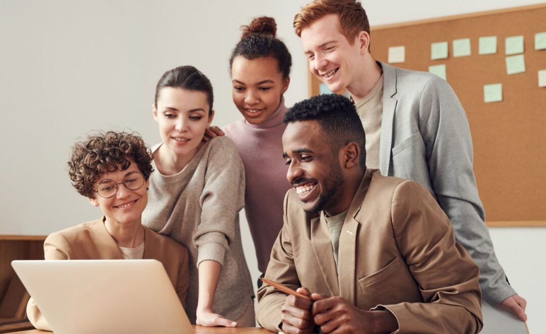 A content team planning together at a desk