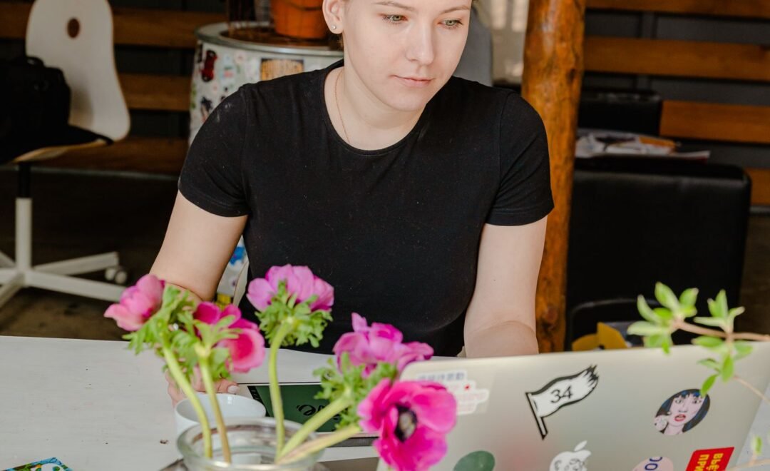A design workspace with brand reference material laid out