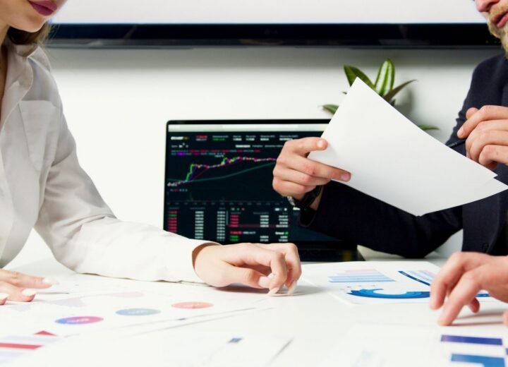 Reviewing social media performance charts on a tablet